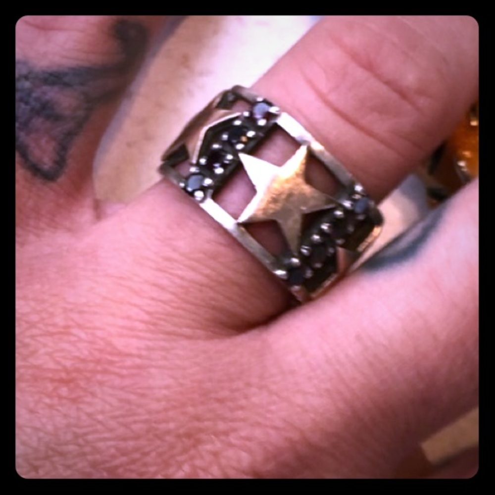 Sterling Silver ring with 8 Ruby’s